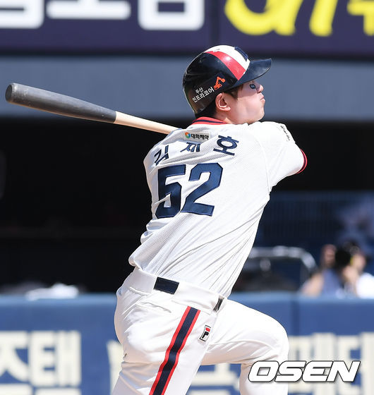 [OSEN=잠실,박준형 기자]1회말 2사 2,3루 두산 김재호가 선취 2타점 적시타를 날리고 있다. / soul1014@osen.co.kr