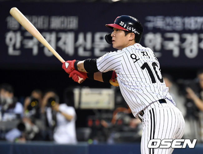 [OSEN=잠실, 이대선 기자]2회말 무사 2,3루에서 LG 오지환이 좌전 2타점 적시 2루타를 치고 있다. /sunday@osen.co.kr