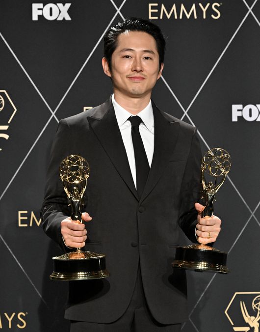 Steven Yeun poses in the press room with the Emmy for outstanding lead actor in a limited or anthology series or movie for BEEF at the 75th Emmy Awards on Monday, Jan. 15, 2024 at the Peacock Theater in Los Angeles. (Photo by Dan Steinberg/Invision for the Television Academy/AP Images)