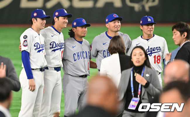 [OSEN=도쿄(일본), 박준형 기자] 경기 종료 후 LA 다저스 사사키 로키, 오타니 쇼헤이, 시카고 컵스 이마나가 쇼타, 스즈키 세이야, 다저스 야마모토 요시노부가 기념 사진을 촬영하고 있다.  2025.03.19 / soul1014@osen.co.kr