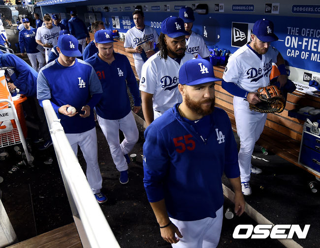 러셀 마틴(55번) 등 패배한 다저스 선수들이 더그아웃을 빠져나가고 있다. /LA(미국 캘리포니아주)=최규한 기자 dreamer@osen.co.kr