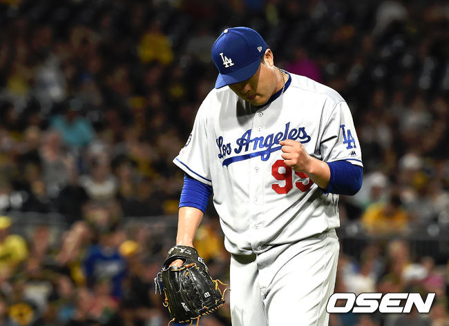 4회말 2사 2,3루 다저스 류현진이 무실점으로 이닝을 마친 뒤 주먹을 쥐며 기뻐하고 있다./ soul1014@osen.co.kr