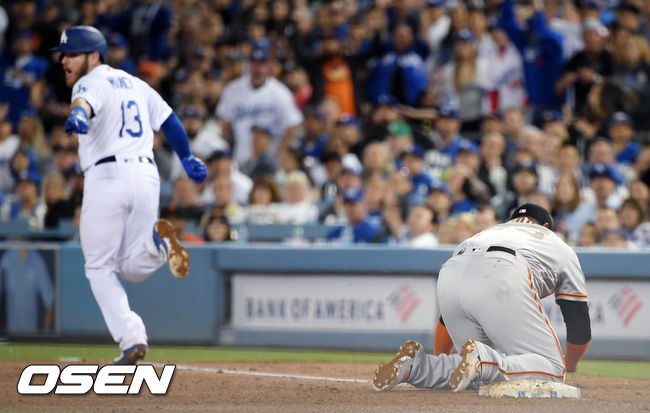 LA다저스 먼시와 샌프란시스코 파블로 산도발. /eastsea@osen.co.kr
