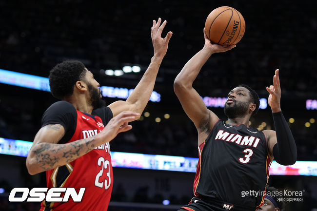 [사진] 앤서니 데이비스(왼쪽)와 드웨인 웨이드. /ⓒGettyimages(무단전재 및 재배포 금지)