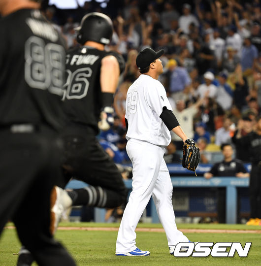 4회초 1사 만루에서 LA 다저스 류현진이 뉴욕 양키스 디디 그레고리우스에게 만루 홈런을 허용하고 아쉬워하고 있다. /dreamer@osen.co.kr