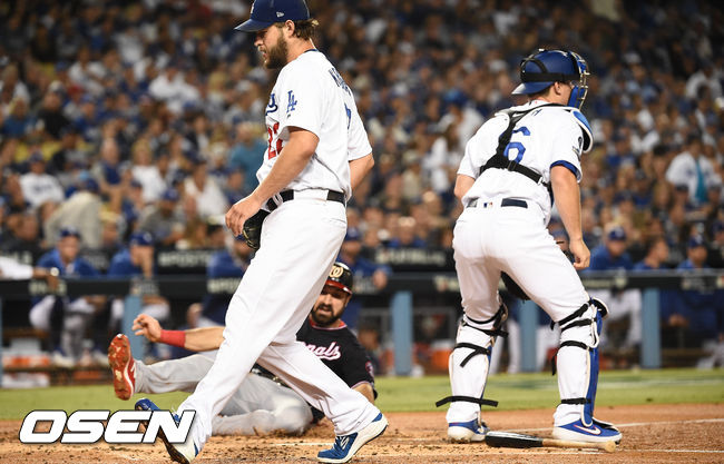2회초 2사 1루 워싱턴 렌던의 1타점 적시 2루타때 다저스 선발투수 커쇼가 실점 허용하고 있다. / soul1014@osen.co.kr