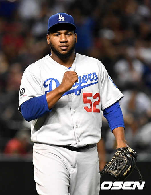 연장 11회말 마운드에 오른 다저스 페드로 바에즈가 삼자범퇴로 경기를 마무리 지으며 기뻐하고 있다. /dreamer@osen.co.kr