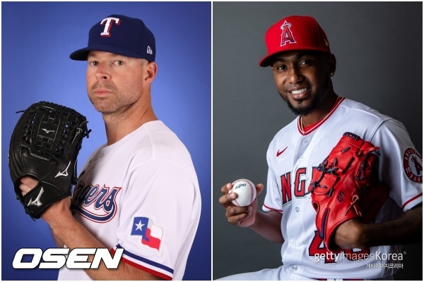 [사진] 코리 클루버(왼쪽)-훌리오 테헤란. ⓒGettyimages(무단전재 및 재배포 금지)