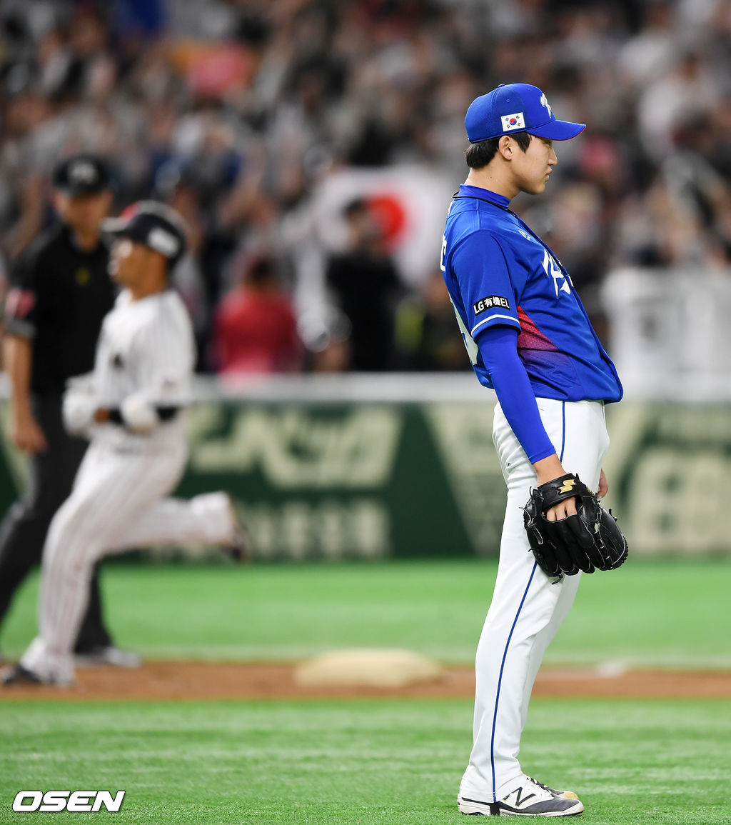 6회말 무사 주자 1루 일본 야마카와에게 우중간 투런 홈런을 허용한 한국 구창모가 아쉬워하고 있다./ spjj@osen.co.kr