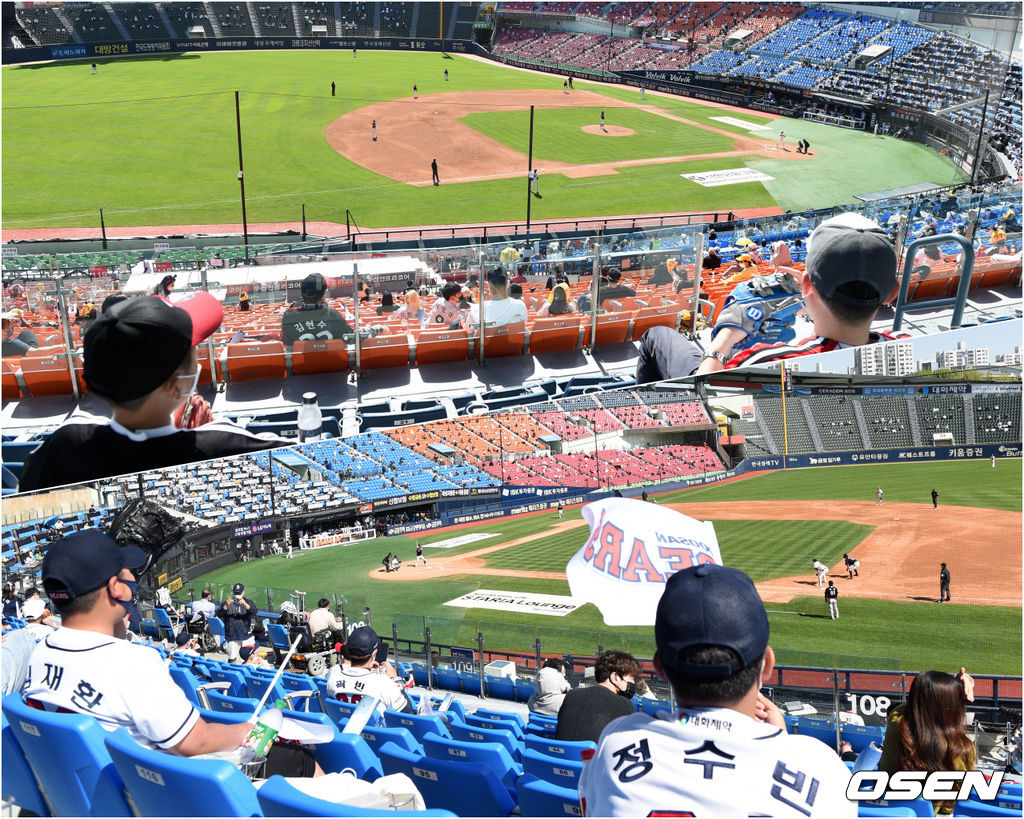 5일 서울 잠실야구장에서 열린 ’2021 신한은행 SOL KBO 리그' 두산 베어스와 LG 트윈스의 경기, 가족과 함께 야구장을 찾은 양팀의 어린이팬이 응원을 펼치고 있다. /sunday@osen.co.kr