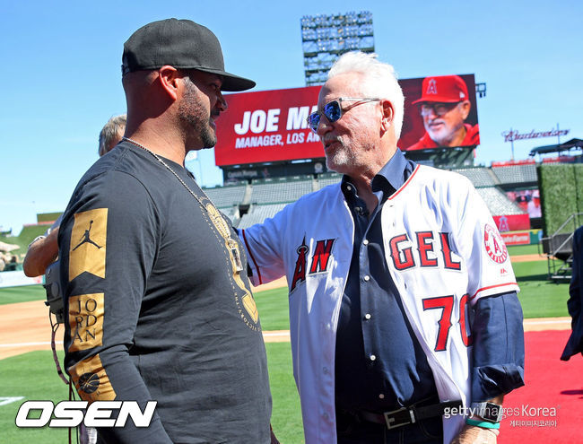 [사진] 2019년 10월 매든 감독 취임식에 참석한 푸홀스(왼쪽) ⓒGettyimages(무단전재 및 재배포 금지)