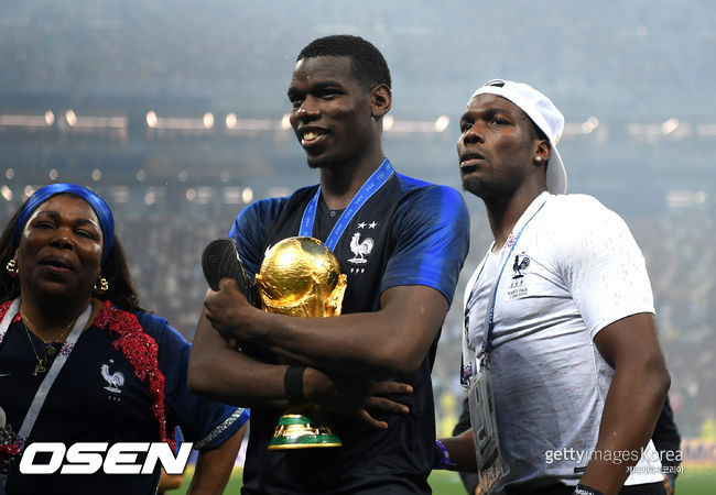 [사진] 폴 포그바(가운데)와 친형 마티아스 포그바(오른쪽). ⓒGettyimages(무단전재 및 재배포 금지)