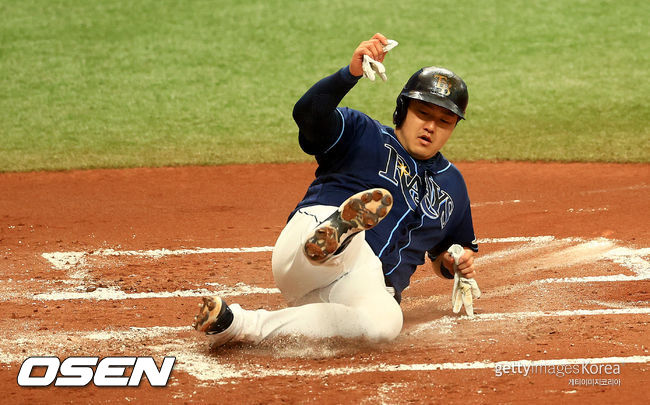 [사진] 28일(한국시간) 홈으로 쇄도하는 탬파베이 레이스 최지만. ⓒGettyimages(무단전재 및 재배포 금지)