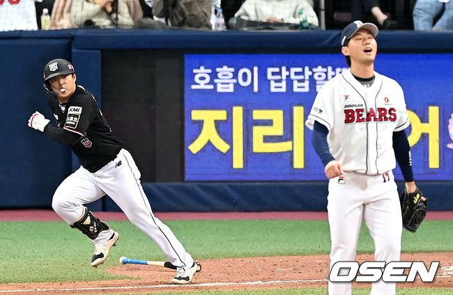 17일 오후 서울 고척스카이돔에서 ’2021 신한은행 SOL KBO리그’ 한국시리즈 3차전 두산 베어스와 KT 위즈의 경기가 열렸다.7회초 1사 1, 3루 상황 KT 조용호가 달아나는 1타점 적시타를 날리고 있다. 아쉬워하는 두산 투수는 홍건희. 2021.11.17 / dreamer@osen.co.kr