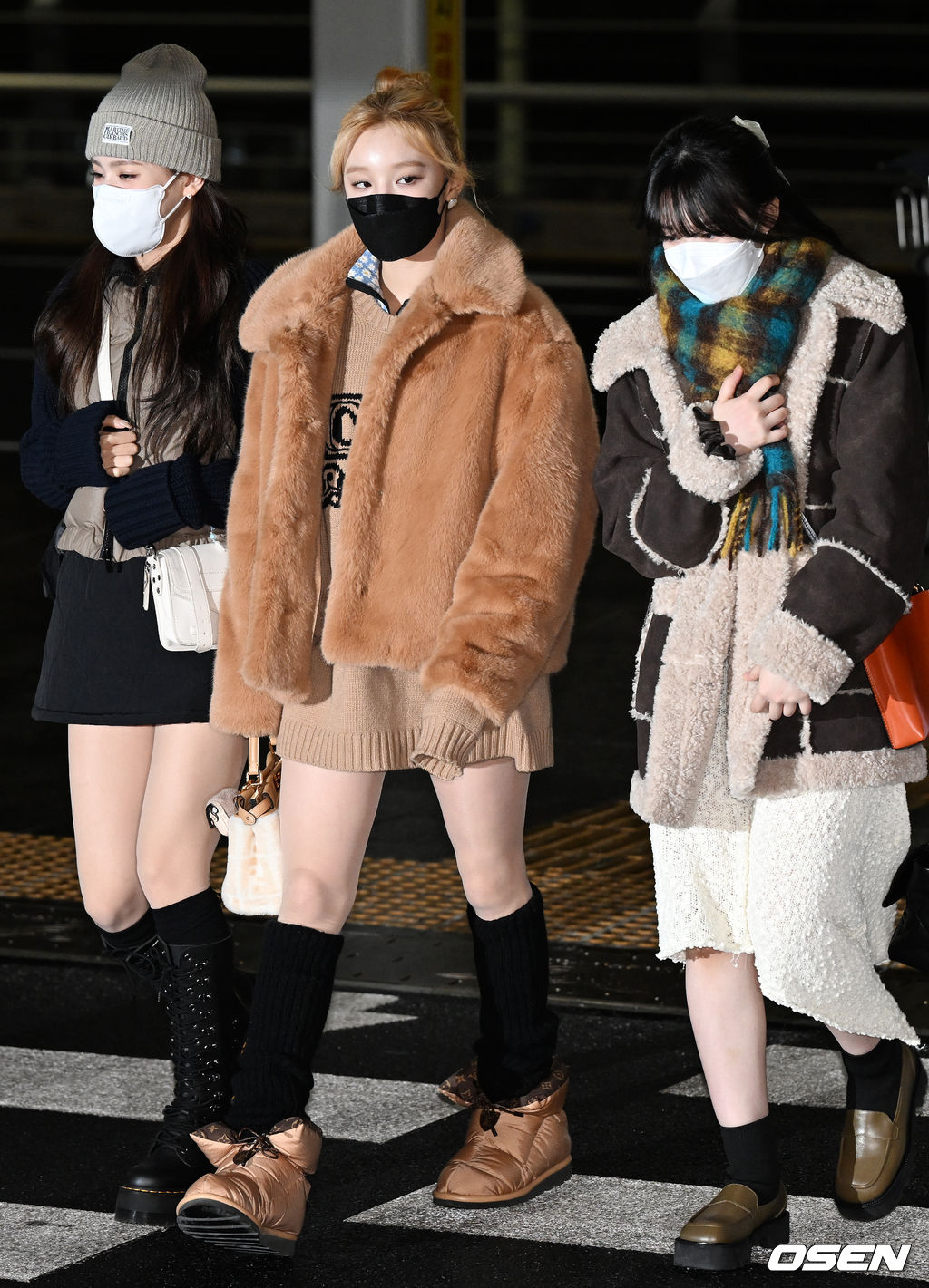 두바이엑스포 '한국의 날'에 진행되는 K팝 콘서트 참석 위해 인천공항 출국장 향하는 그룹 (여자)아이들 미연-우기-슈화. 2022.01.15 /rumi@osen.co.kr