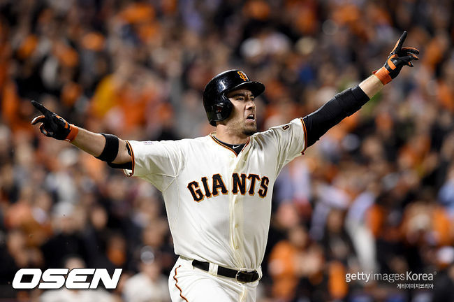 [사진] 2014년 NLCS 5차전에서 트래비스 이시카와가 끝내기 홈런을 치고 있다. ⓒGettyimages(무단전재 및 재배포 금지)