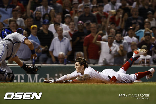 [사진] 지난해 보스턴-토론토 경기에서 자렌 듀란의 홈슬라이딩. ⓒGettyimages(무단전재 및 재배포 금지)