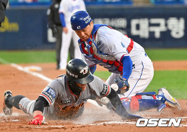 한화 이글스 노수광이 1회초 1사 1,3루 노시환 타석때 더블스틸을 시도 홈에서 세이프되고 있다. 2022.04.14 / foto0307@osen.co.kr