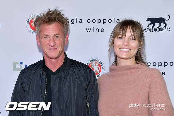 LOS ANGELES, CALIFORNIA - MARCH 08: (L-R) Sean Penn and Leila George attend "Meet Me In Australia" To Benefit Australia Wildfire Relief Efforts, hosted by The Greater Los Angeles Zoo Association, at Los Angeles Zoo on March 08, 2020 in Los Angeles, California. (Photo by Rodin Eckenroth/Getty Images)