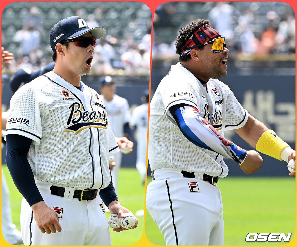 두산 김재환과 페르난데스가 어린이 팬을 향해 KBO리그 40주년 공인구를 던져주고 팬들의 반응에 재밌는 표정을 지어 보이고 있다. 2022.04.24 /jpnews@osen.co.kr