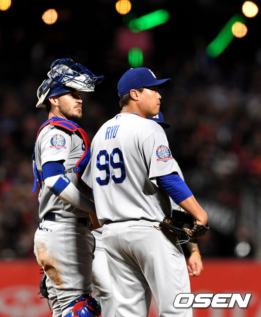 LA 다저스 시절 야스마니  그랜달과 류현진(오른쪽). /dreamer@osen.co.kr