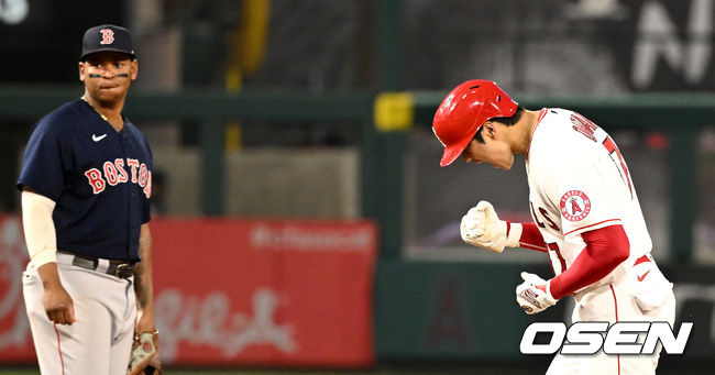 5회말 1사 주자없는 상황 에인절스 오타니가 역전 좌중간 투런포를 날리고 그라운드를 돌며 포효하고 있다. 2022.06.10 / dreamer@osen.co.kr