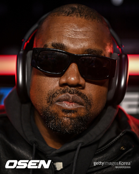 ATLANTA, GA - OCTOBER 23: Ye poses for a photo as he arrives for the fight between Jamel Herring and Shakur Stevenson at State Farm Arena on October 23, 2021 in Atlanta, Georgia. (Photo by Brandon Magnus/Getty Images)