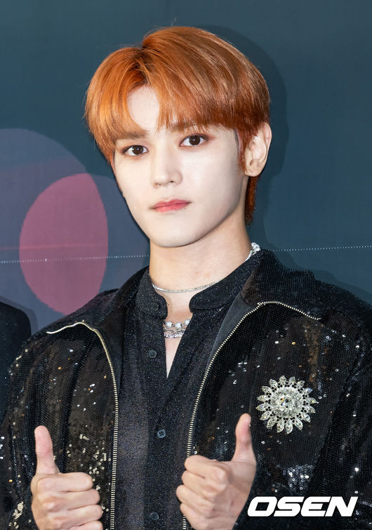 23일 오후 서울 송파구 잠실종합운동장 올림픽주경기장에서 NCT 127 월드투어 서울 스페셜 공연 ‘NEO CITY : SEOUL – THE LINK +’(네오 시티 : 서울 – 더 링크 플러스)의 기자회견이 열렸다.<br /><br />이 자리에는 NCT 127(엔씨티 127) 멤버 태일, 쟈니, 태용, 유타, 도영, 재현, 마크, 해찬, 정우가 참석했다.<br /><br />NCT 127 태용이 입장하며 포즈를 취하고 있다. 2022.10.23 / rumi@osen.co.kr