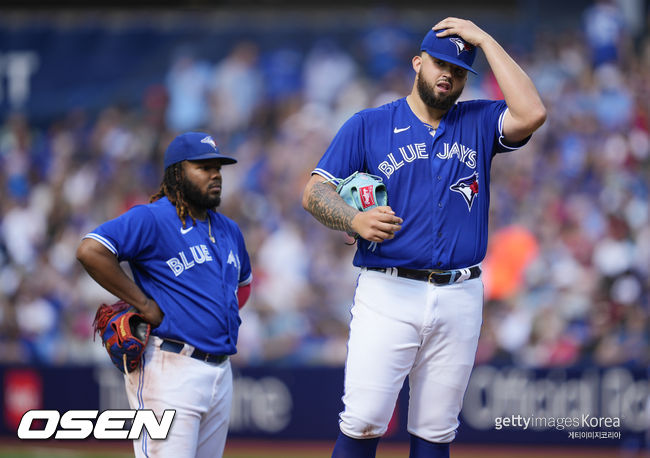 TORONTO, ON - JULY 29: Alek Manoah #6 of the Toronto Blue Jays reacts after hitting Taylor Ward #3 of the Los Angeles Angels with a pitch during the fifth inning in their MLB game at the Rogers Centre on July 29, 2023 in Toronto, Ontario, Canada. (Photo by Mark Blinch/Getty Images)