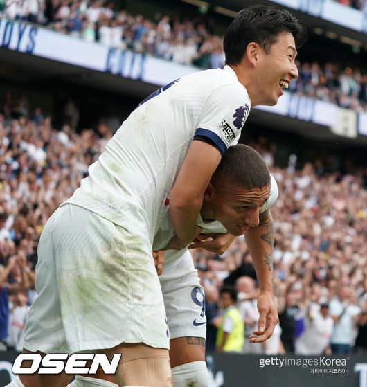 LONDON, ENGLAND - SEPTEMBER 16: Tottenham's Heung-Min Son celebrates with team-mate Richarlison during the Premier League match between Tottenham Hotspur and Sheffield United at Tottenham Hotspur Stadium on September 16, 2023 in London, England. (Photo by Stephanie Meek - CameraSport via Getty Images)                                                                                                                         