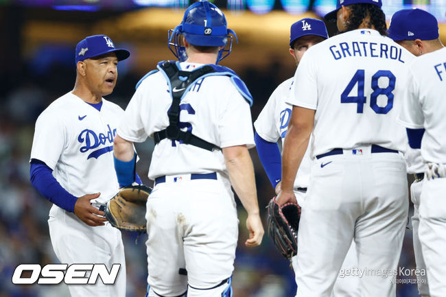 [사진] LA 다저스 데이브 로버츠 감독(왼쪽). ⓒGettyimages(무단전재 및 재배포 금지)