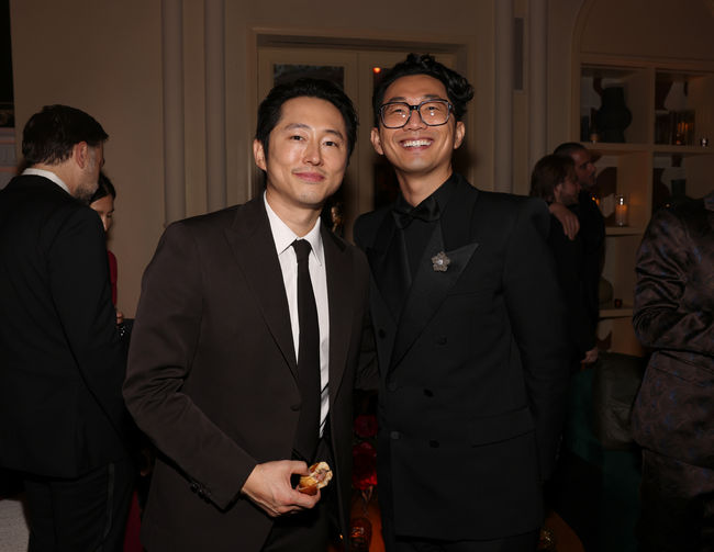 LOS ANGELES, CALIFORNIA - JANUARY 15: (L-R) Steven Yeun and  attend the 2024 Netflix Primetime Emmys after party on January 15, 2024 in Los Angeles, California. (Photo by Natasha Campos/Getty Images for Netflix)