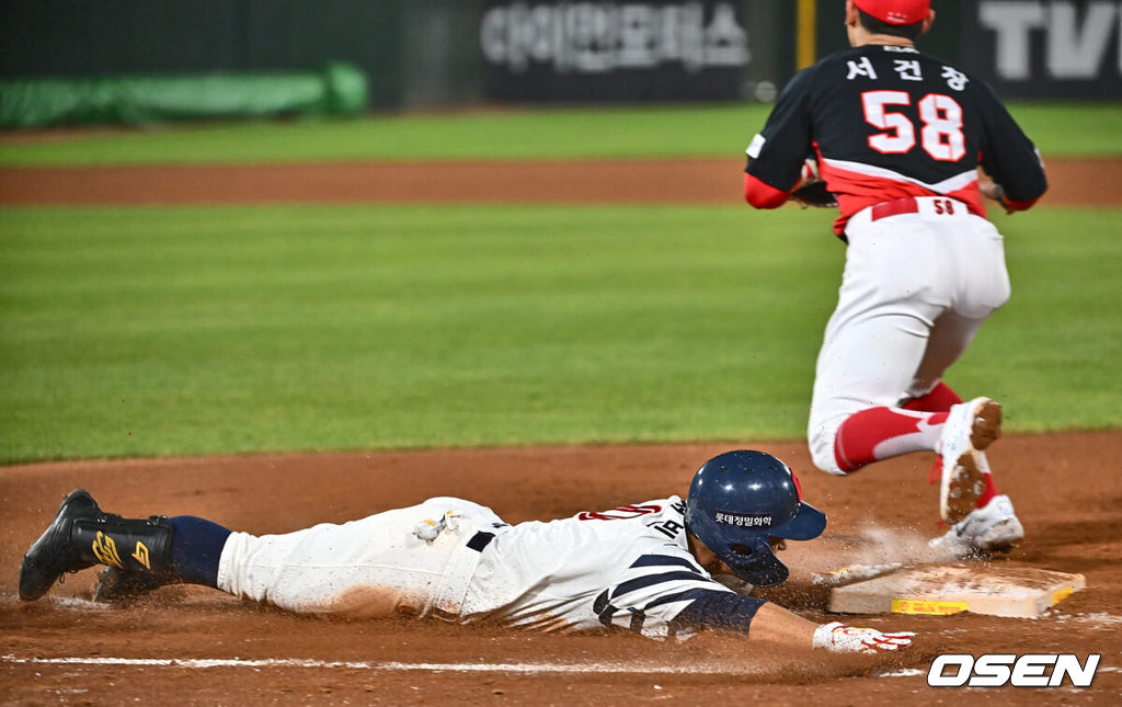 롯데 황성빈이 7회 1루 헤드 퍼스트 슬라이딩으로 내야 안타를 만들고 있다. 2024.05.22 / foto0307@osen.co.kr