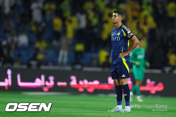 ABHA, SAUDI ARABIA - AUGUST 17: Cristiano Ronaldo of Al Nassr looks on during the Saudi Super Cup Final match between  Al Nassr and Al Hilal at Prince Sultan bin Abdul Aziz Stadium on August 17, 2024 in Abha, Saudi Arabia.  (Photo by Yasser Bakhsh/Getty Images)