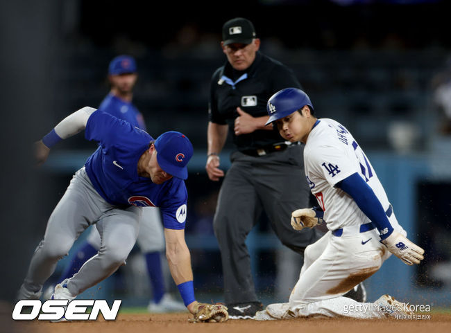 [사진] LA 다저스 오타니 쇼헤이(오른쪽)가 2루 도루에 성공하고 있다. ⓒGettyimages(무단전재 및 재배포 금지)