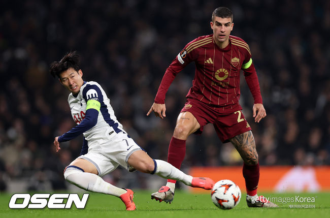 LONDON, ENGLAND - NOVEMBER 28: Son Heung-Min of Tottenham Hotspur is challenged by Gianluca Mancini of AS Roma during the UEFA Europa League 2024/25 League Phase MD5 match between Tottenham Hotspur and AS Roma at Tottenham Hotspur Stadium on November 28, 2024 in London, England. (Photo by Julian Finney/Getty Images)