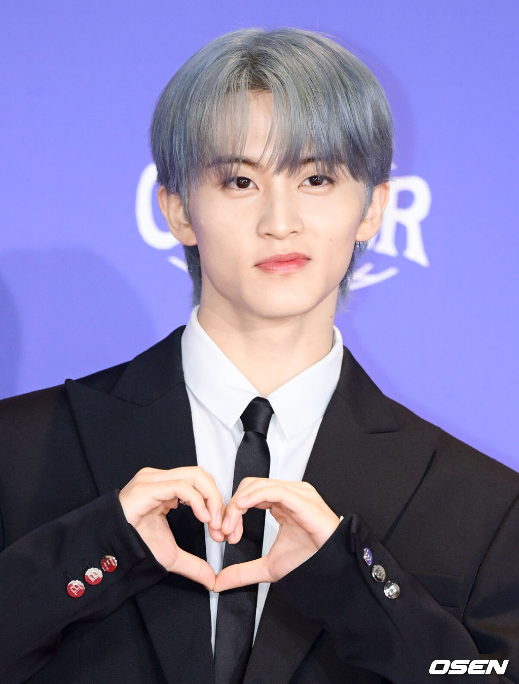 그룹 NCT DREAM(엔시티 드림, 이하 NCT 드림)의 정규 5집 ‘Go Back To The Future’(고 백 투 더 퓨처) 발매 기념 제작 발표회가 14일 서울 송파구 롯데시네마 월드타워에서 열렸다.이번 앨범은 가장 빛나는 ‘나’를 찾기 위해 시간 여행을 떠난 호기심 많은 괴짜 NCT DREAM이 과거와 현재, 미래를 넘나드는 여정을 스펙터클하게 그려낸 작품이다. 더블 타이틀곡 ‘BTTF’(비티티에프 / 백 투 더 퓨처)와 ‘CHILLER’를 포함한 총 9곡이 수록돼 있다.NCT 마크가 포즈를 취하고 있다. 2025.07.14/cej@osen.co.kr