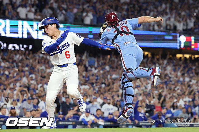 [사진] LA 다저스 김혜성이 NLDS 4차전에서 연장 11회 끝내기 득점을 올리고 있다. ⓒGettyimages(무단전재 및 재배포 금지)