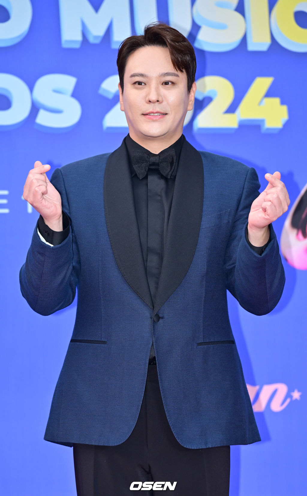 16일 오후 서울 중구 장충동 장충체육관에서 '한터뮤직어워즈 2024' 레드카펫 행사가 열렸다.2일차인 이날 라이즈(RIIZE), LIGHTSUM(라잇썸), 8TURN(에잇턴), NCT WISH(엔시티 위시), 영탁, YOUNG POSSE(영파씨), EVNNE(이븐), 이승윤, 최예나, 허용별(허각, 신용재, 임한별), 김호영, 뮤지, 박미경, 소유, 이희진, 인순이, 장우혁, 제아, 황보 등이 참석했다.가수 김용준이 포즈를 취하고 있다. 2025.02.16 / rumi@osen.co.kr