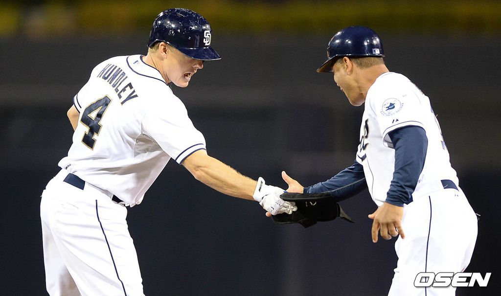 샌디에이고 선수 시절 닉 헌들리(왼쪽)가 데이브 로버츠 코치와 기뻐하고 있다. 2013.07.31 /sunday@osen.co.kr