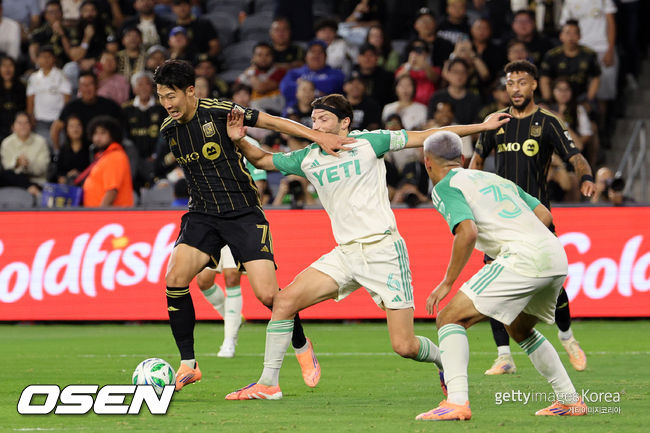 LOS ANGELES, CALIFORNIA - OCTOBER 29: Son Heung-Min #7 of LAFC controls the ball against Ilie Sánchez #6 of Austin FC during the first half of their 2025 MLS Cup Playoffs game at BMO Stadium on October 29, 2025 in Los Angeles, California. (Photo by Kevork Djansezian/Getty Images)