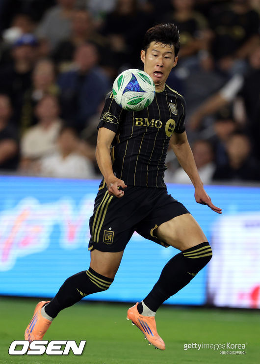 LOS ANGELES, CALIFORNIA - OCTOBER 29: Son Heung-Min #7 of LAFC controls the ball against Brendan Hines-Ike #4 of Austin FC during the first half of their 2025 MLS Cup Playoffs game at BMO Stadium on October 29, 2025 in Los Angeles, California. (Photo by Kevork Djansezian/Getty Images)