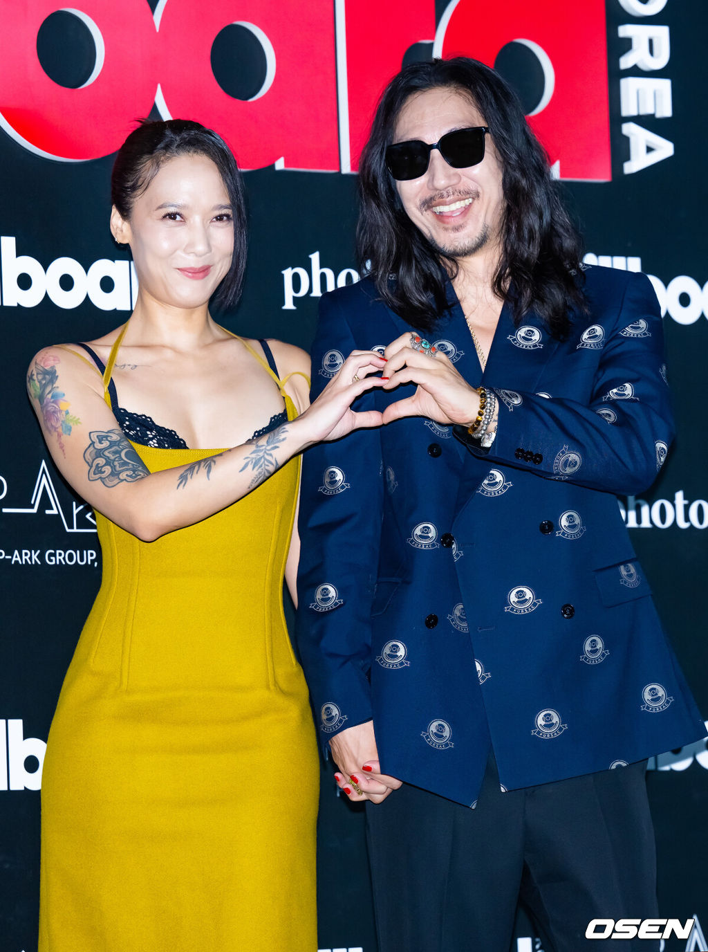 27일 오후 서울 중구 서울 신라호텔 영빈관에서 'Billboard K POWER 100' 이벤트 포토월 행사가 진행됐다. 이 행사는 빌보드 코리아의 공식 론칭을 기념하는 자리로, 한국 대중음악의 근 100년 역사를 기념하며 K-팝을 중심으로 한 한국 음악이 세계 음악 산업에 끼친 영향력을 조명하기 위해 마련됐다.윤미래와 타이거 JK가 포토타임을 갖고 있다. 2024.08.27 / rumi@osen.co.kr
