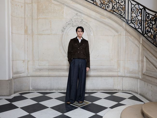 PARIS, FRANCE - JANUARY 21: Mingyu attends the Dior Homme Menswear Fall/Winter 2026-2027 show as part of Paris Fashion Week on January 21, 2026 in Paris, France. (Photo by Arnold Jerocki/Getty Images for Dior)