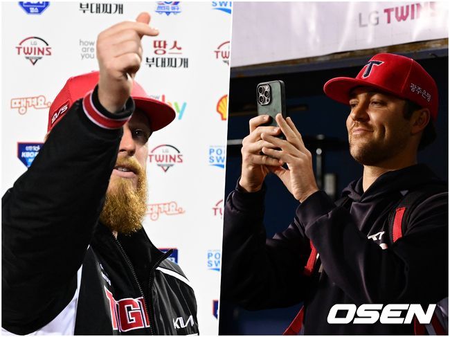 올러의 모습 휴대전화에 담고