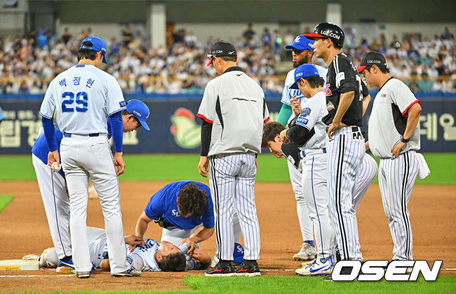 [OSEN=대구, 이석우 기자] 8일 대구삼성라이온즈파크에서 2026 신한 SOL KBO 리그 삼성 라이온즈와 LG 트윈스의 경기가 열렸다. 홈팀 삼성은 오러클린이, 방문팀 LG는 임찬규가 선발 출전했다. 삼성 라이온즈 류지혁이 6회초 무사 2루 투수 희생번트를 댄 LG 트윈스 구본혁과 충돌해 쓰러져 있다. 2026.07.08 / foto0307@osen.co.kr