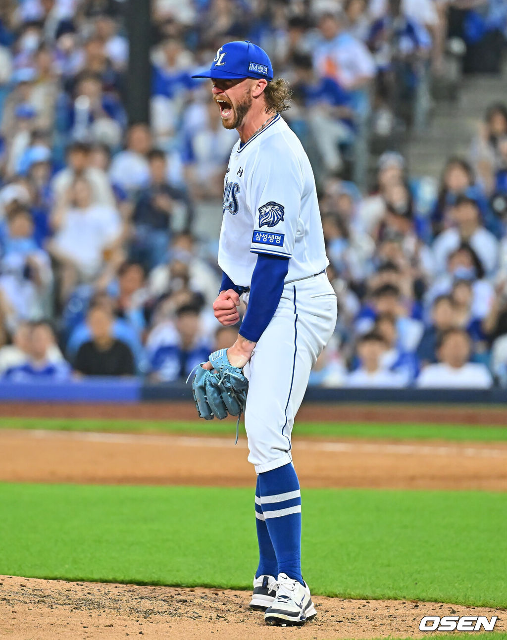 18일 대구삼성라이온즈파크에서 2026 신한 SOL KBO 리그 삼성 라이온즈와 롯데 자이언츠의 경기가 열렸다. 홈팀 삼성은 페덱이, 방문팀 롯데는 나균안이 선발 출전했다. 삼성 라이온즈 선발 투수 페덱이 6회초 2사 1루 롯데 자이언츠 고승민을 삼진으로 잡고 첫 등판을 마무리하며 포효하고 있다. 2026.07.18 / foto0307@osen.co.kr