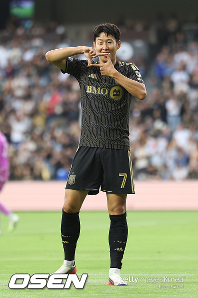 LOS ANGELES, CALIFORNIA - JULY 25: Son Heung-Min #7 of Los Angeles FC celebrates after scoring the team's first goal during the MLS match between Los Angeles Football Club and Sporting Kansas City during the MLS match between Los Angeles Football Club and Sporting Kansas City at BMO Stadium on July 25, 2026 in Los Angeles, California. (Photo by Luiza Moraes/Getty Images)