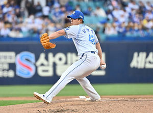 OSEN 기사 속 투구 장면